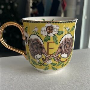 Anthropologie Yellow Mug with Gold Handle and Elephant Design